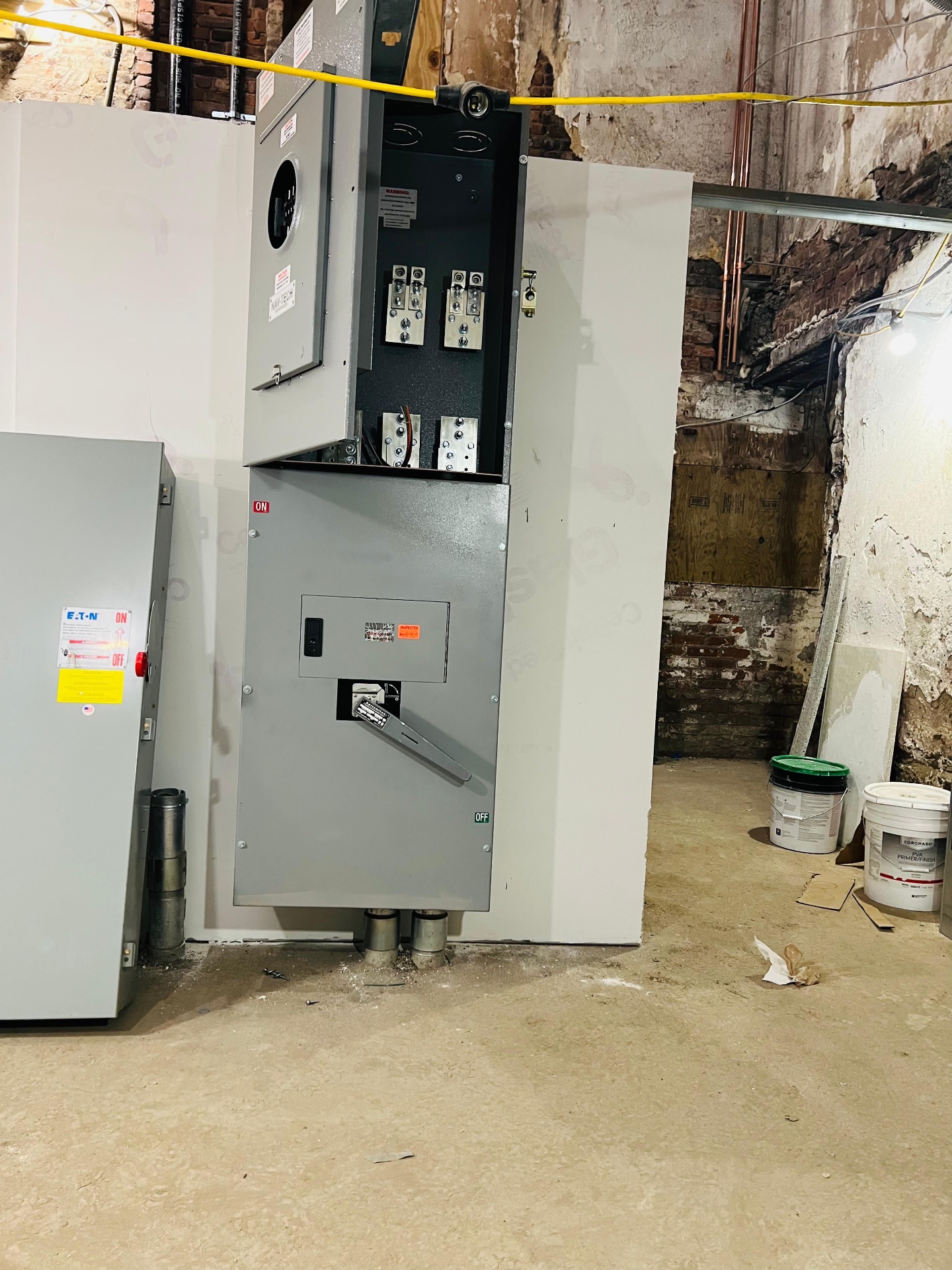 Commercial switchgear and service equipment set and inspected in a building service room